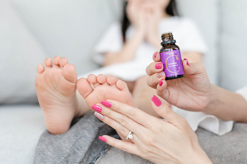 Lavender oil applying on feet